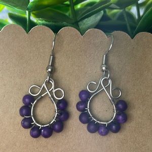 Hand crafted purple beaded silver tone earrings